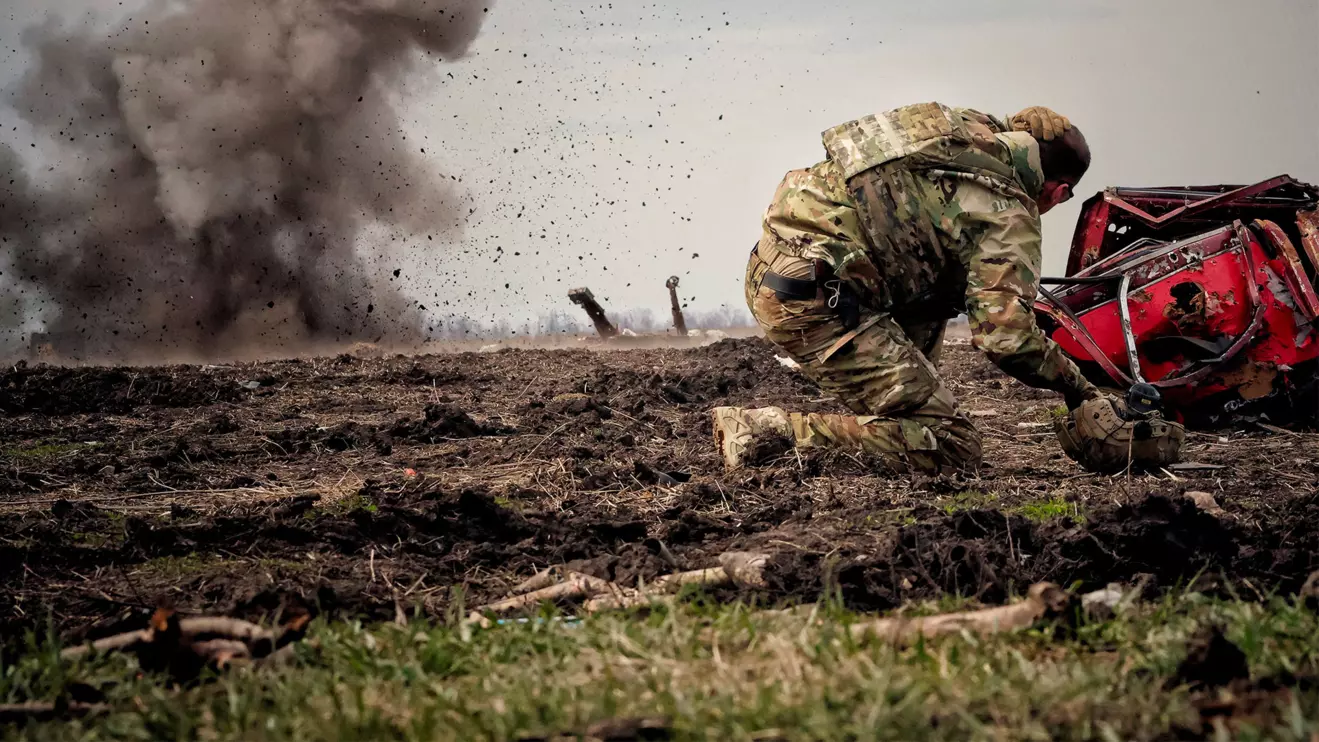 Ukrainian serviceman reacts as he throws a grenade during a training, amid Russia's invasion of Ukraine, in Donbas region, Ukraine April 8, 2023. Reuters/Yan Dorbronosov