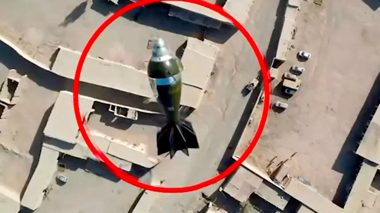 A mortar round falls towards a target from a drone, in this still image from handout video, said to show Pakistani forces conducting a strike on an Afghan Taliban border post, in Spin Boldak, Afghanistan, October 15, 2025. ISPR/Handout via Reuters
