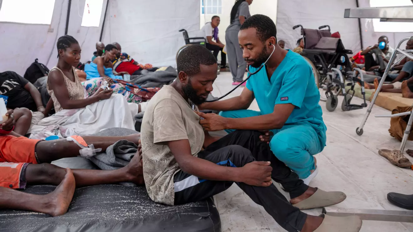 A health worker treats a patient with suspected bullet wounds at the CBCA Ndosho Hospital, a few days after the M23 rebel group seized the town of Goma, in Goma, North Kivu province in eastern Democratic Republic of the Congo, February 1, 2025. Reuters/Arlette Bashizi