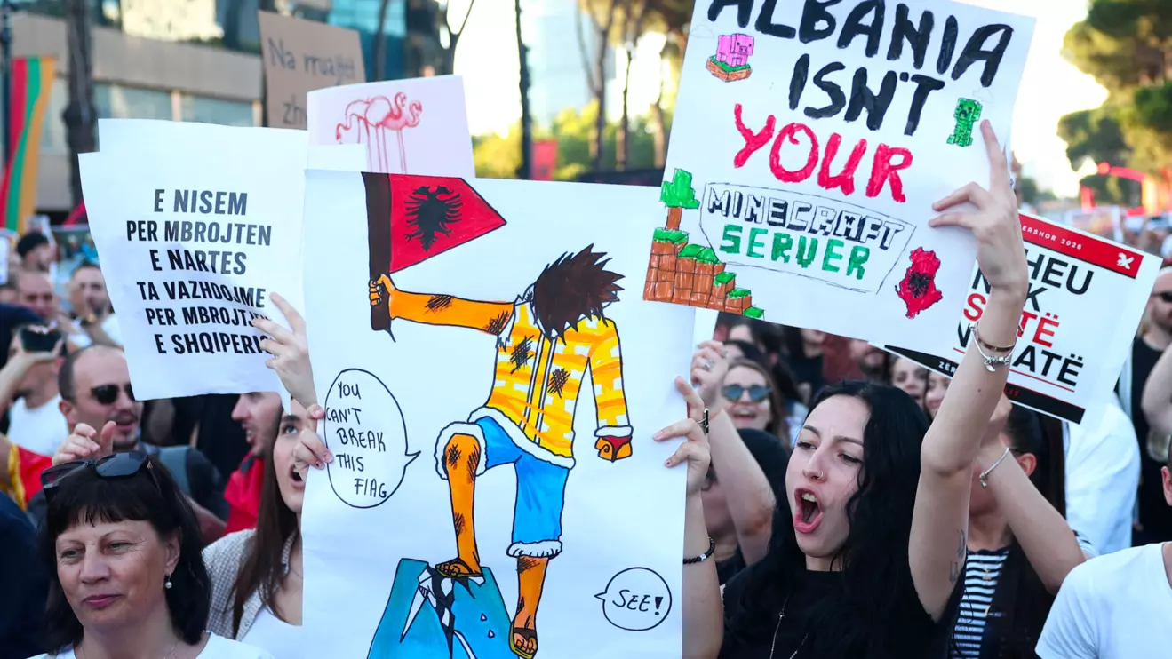Protesters hold banners during a protest against a luxury resort development planned by a company linked with Donald Trump's son-in-law, Jared Kushner, on an environmentally sensitive part of the Adriatic coast, in Tirana, Albania, June 4, 2026. Reuters/Florion Goga