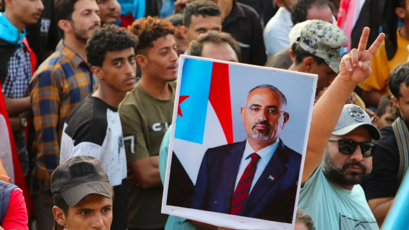 Supporters of the UAE-backed separatist Southern Transitional Council (STC) hold a poster of Aidarous al-Zubaidi, the STC's leader, who, according to the Saudi-backed coalition, fled to an unknown destination, in Aden, Yemen, December 21, 2025. Reuters/Fawaz Salman