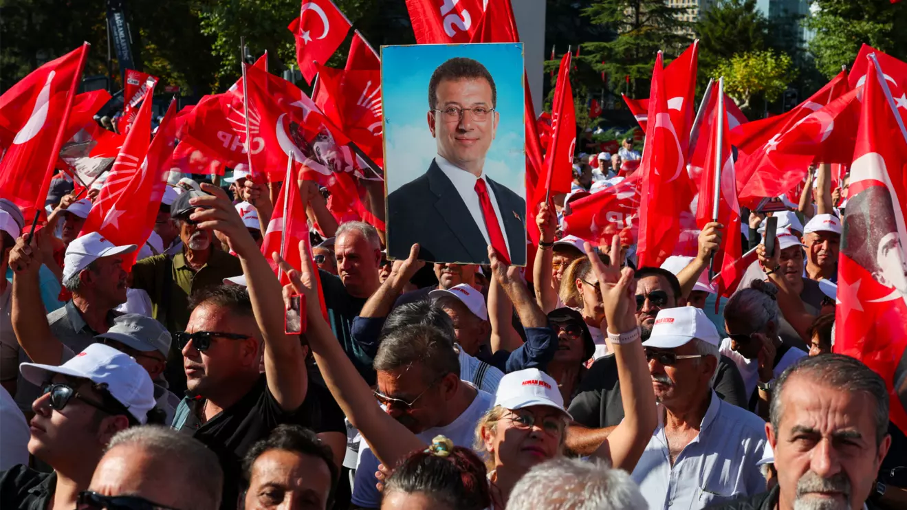 A supporter of main opposition Republican People's Party (CHP) holds a portrait of jailed Istanbul Mayor Ekrem Imamoglu during a rally, a day before a court is set to rule on whether to annul the party's last general congress and unseat its leader Ozgur Ozel, in Ankara, Turkey, September 14, 2025. Reuters/Umit Bektas