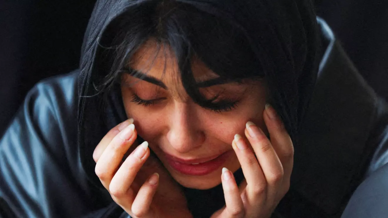 A mourner reacts as she attends a funeral ceremony for victims of Israeli and U.S. strikes, amid the U.S.-Israeli conflict with Iran, in Tehran, Iran. Majid Asgaripour/WANA (West Asia News Agency) via Reuters