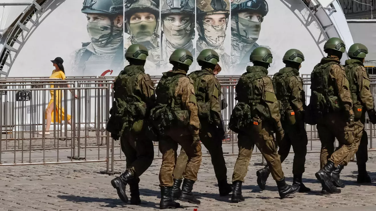Russian servicemen walk at an exhibition displaying armoured vehicles and equipment captured by the Russian army from Ukrainian forces in the course of Russia-Ukraine conflict, at Victory Park open-air museum on Poklonnaya Gora in Moscow, Russia May 31, 2024. Reuters/Shamil Zhumatov