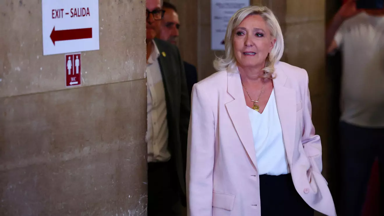 French far-right leader Marine Le Pen, member of parliament for the Rassemblement National (National Rally - RN) party, arrives to attend the verdict in her appeal trial, alongside the RN party itself and 10 others defendants found guilty of diverting European Parliament funds, at the Paris courthouse on the Ile de la Cite, in Paris, France, July 7, 2026. Reuters/Sarah Meyssonnier