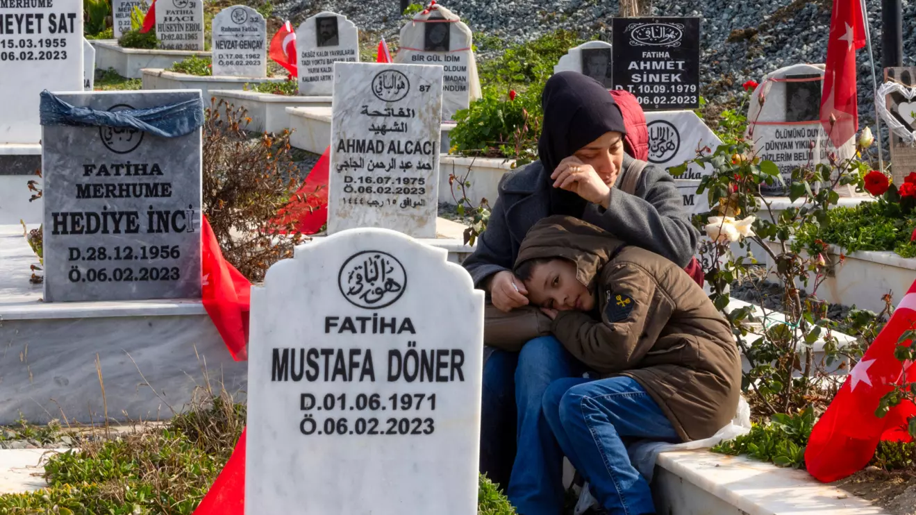 People visit a cemetery for people killed by the earthquake two years ago, in Hatay, Turkey, February 6, 2025. Reuters/Serdar Ozsoy