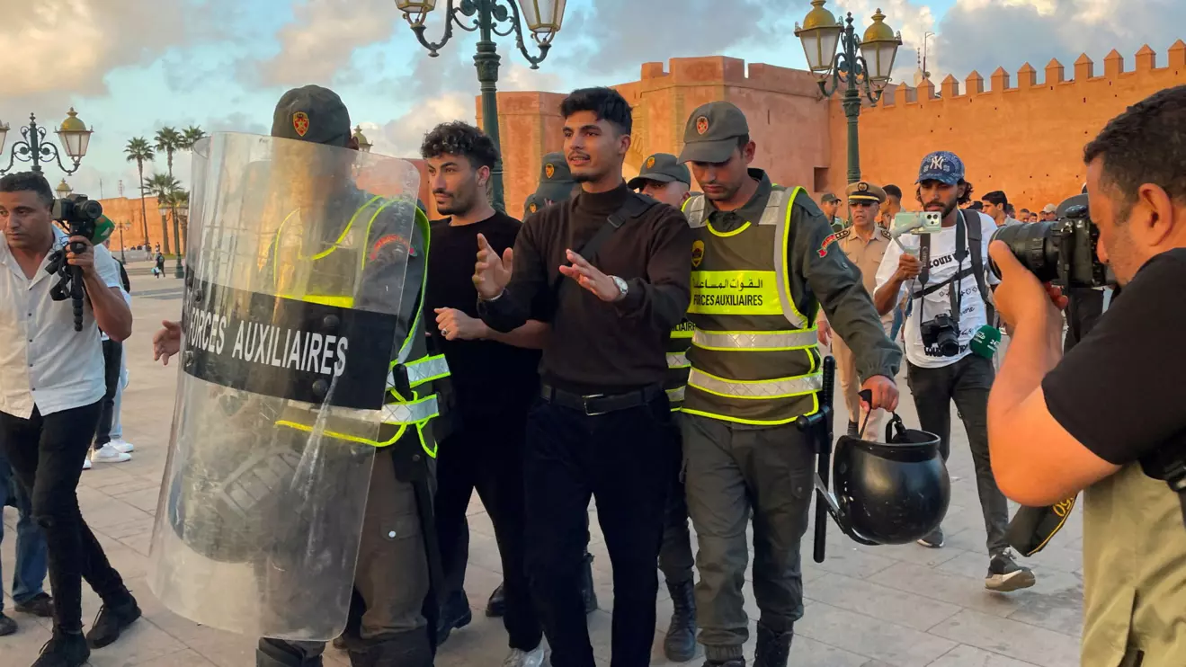 Members of the security forces detain a man as they prevent a protest demanding reforms in education and health from taking place, in Rabat, Morocco, September 29, 2025. Reuters/Ahmed El Jechtimi