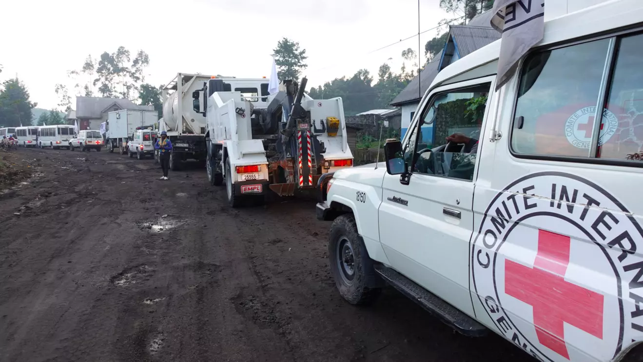 An International Committee of the Red Cross convoy escorts the now-unarmed Congolese soldiers and police officers, as well as their families who sought refuge at the United Nations Organization Stabilization Mission in the Democratic Republic of the Congo (MONUSCO) base since the capture by M23 rebels in January; in Goma, North Kivu province of the Democratic Republic of Congo, April 30, 2025. International Committee of the Red Cross/Handout via Reuters