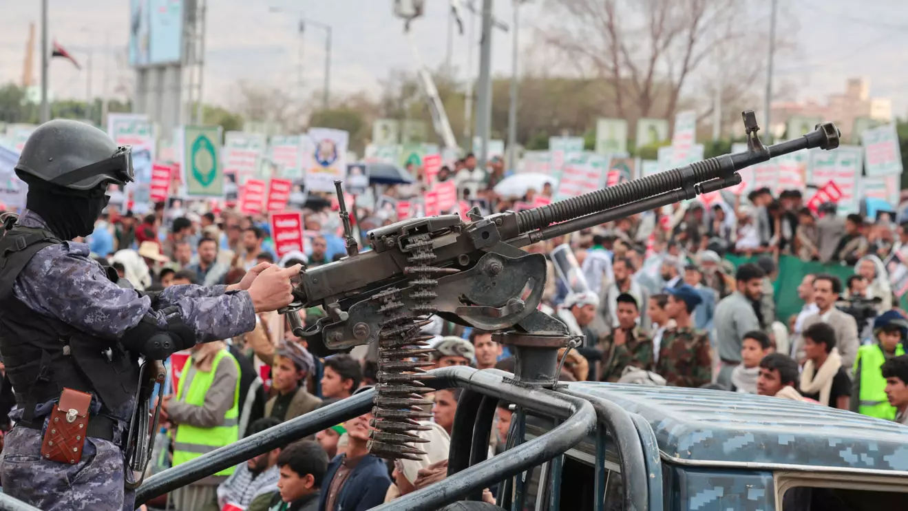 A member of Houthi security force mans a machine gun mounted on the back of a patrol truck as Houthi supporters rally against the Saudi-led coalition's restrictions on Houthi-controlled areas, which the group describes as a blockade, in Sanaa, Yemen, July 17, 2026. Reuters/Khaled Abdullah