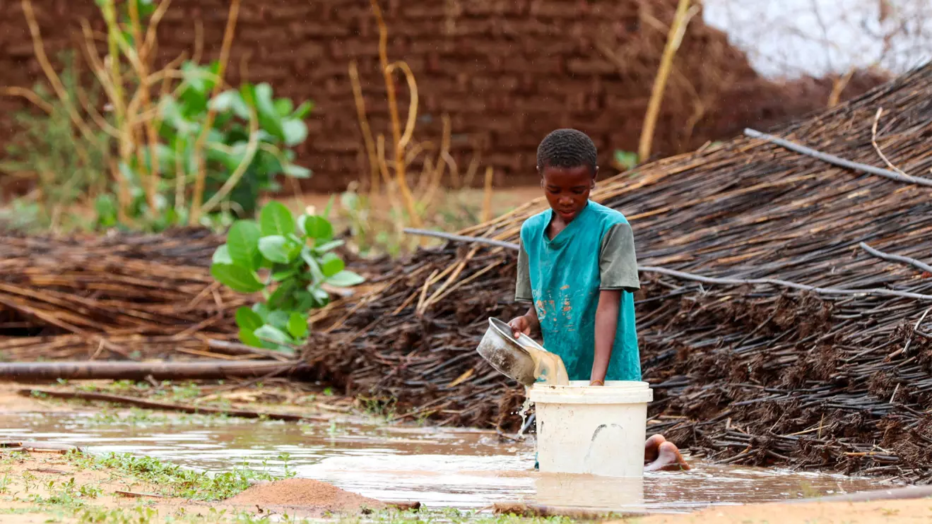 A displaced Sudanese child pours water at Zamzam camp, in North Darfur, Sudan, August 1, 2024. Reuters/Mohamed Jamal Jebrel