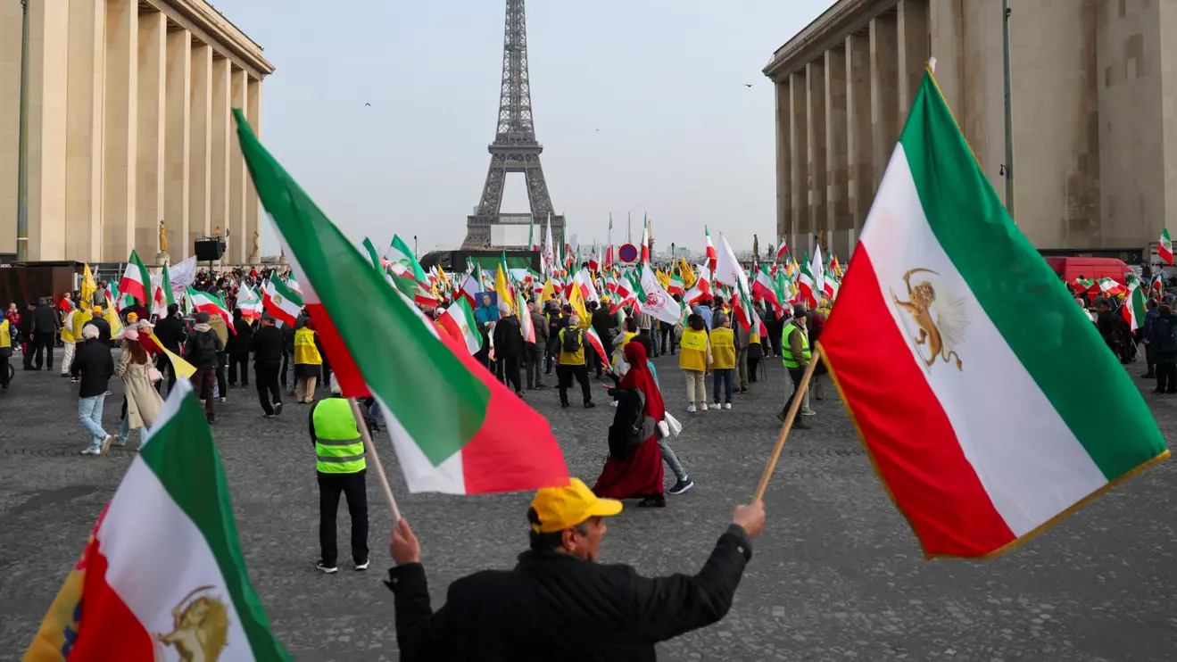 People attend a protest organised by the National Council of Resistance of Iran against the government of the Islamic Republic, amid the U.S.-Israeli conflict with Iran, in front of the Eiffel Tower in Paris, France, March 7, 2026. Reuters/Stephane Mahe