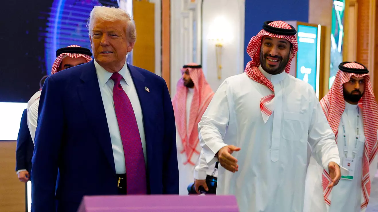 Saudi Crown Prince Mohammed Bin Salman reacts next to U.S. President Donald Trump during the Saudi-U.S. Investment Forum, in Riyadh, Saudi Arabia, May 13, 2025. Reuters/Brian Snyder