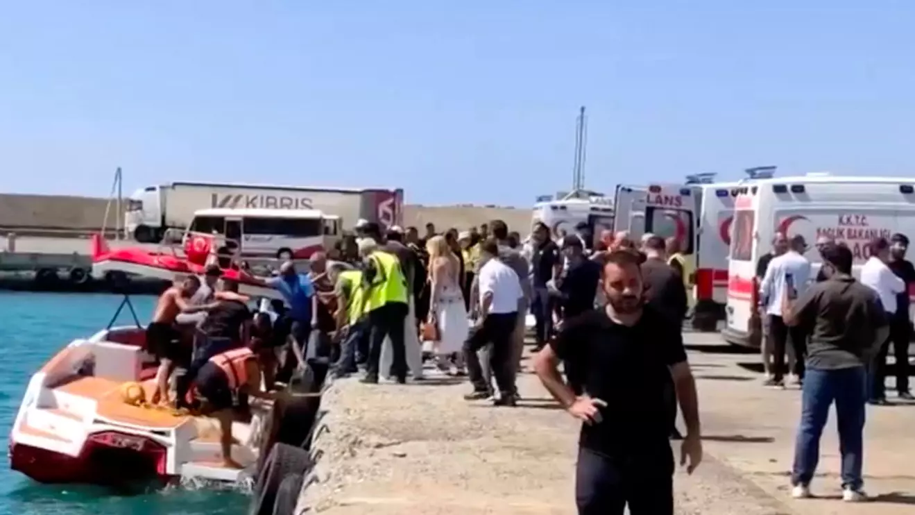 Rescue boats bring passengers to shore from capsized boat in northern Cyprus, August 30, 2026 in this screengrab taken from a video. Reuters