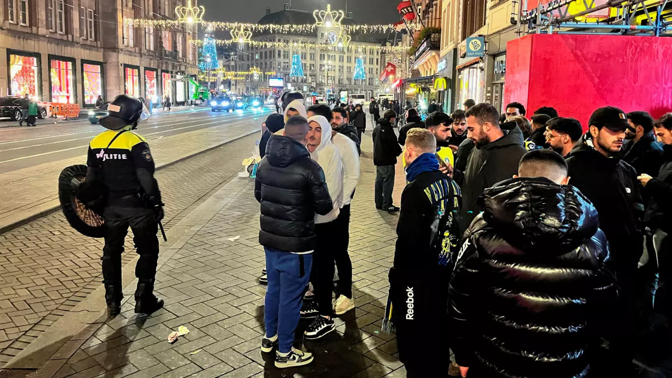Israeli Maccabi Tel Aviv supporters are guarded by police after violence targeting Israeli football fans broke out in Amsterdam overnight, in Amsterdam, Netherlands, November 8, 2024. Reuters/Ami Shooman/Israel Hayom