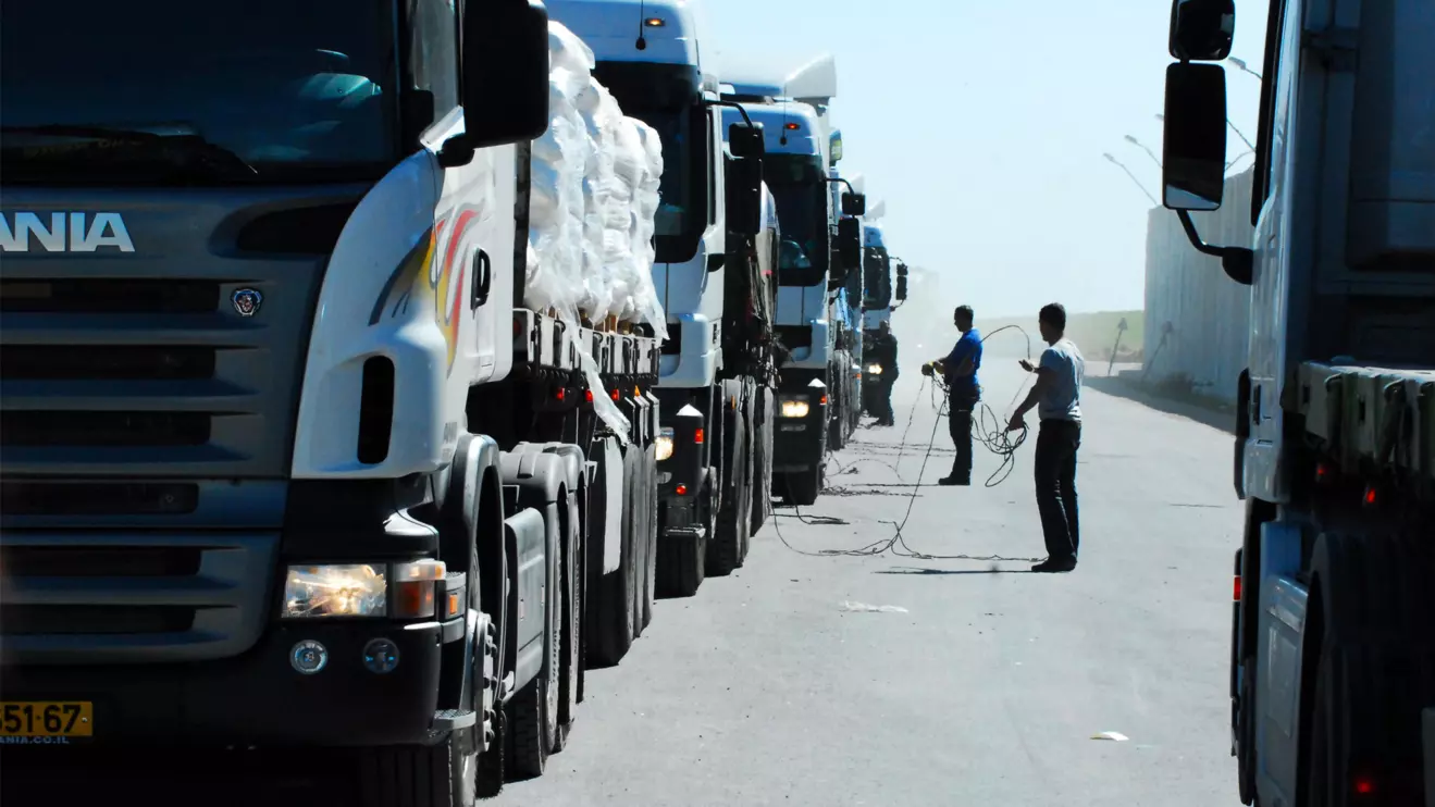 Palestinian media said 50 trucks carrying flour, cooking oil and legumes would be allowed into the small coastal territory later on Monday © Mena Today 