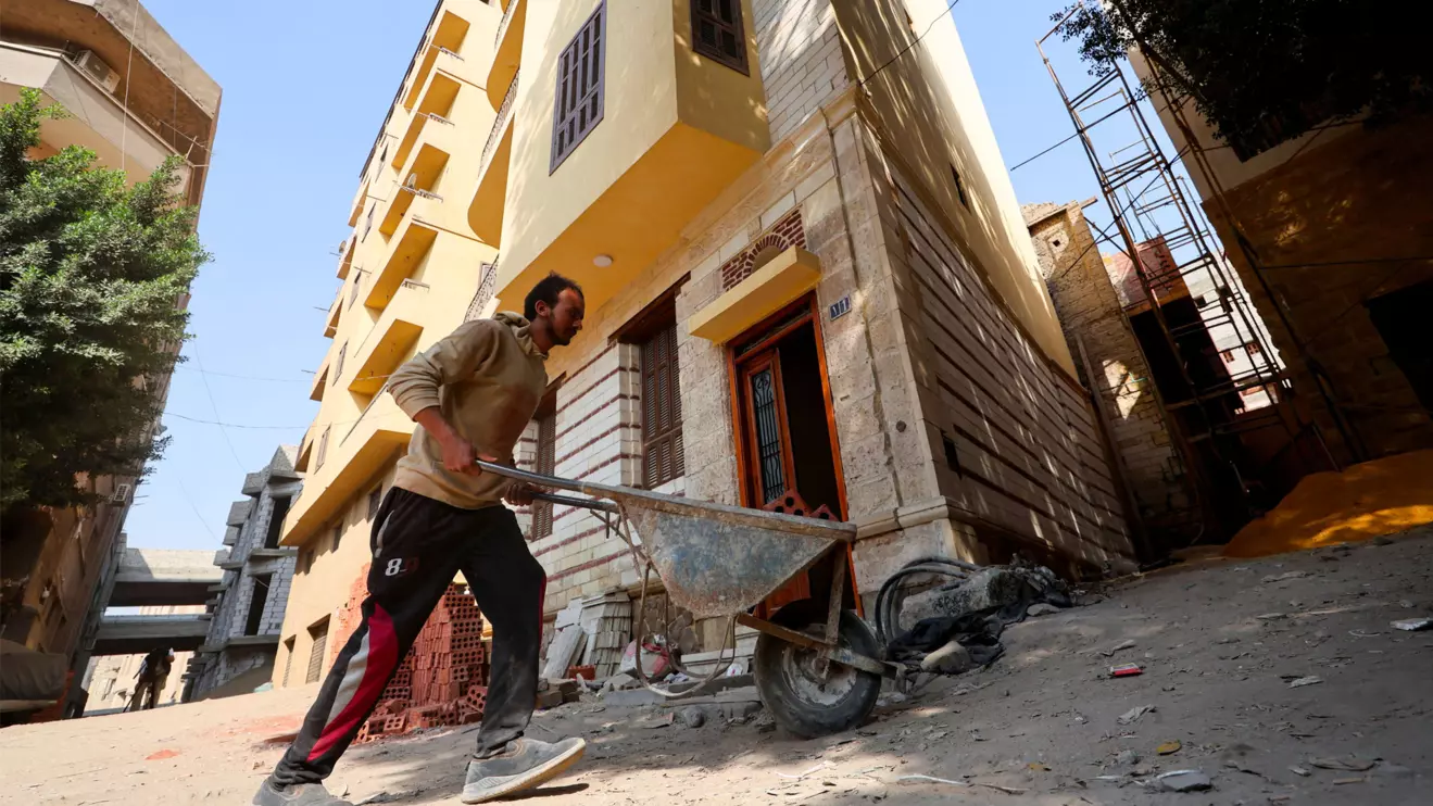 An Egyptian man works on-site at the Darb al-Labbana restoration project, designed to rebuild the historic yet dilapidated neighbourhood in old Cairo, Egypt, November 18, 2025. Reuters/Mohamed Abd El Ghany