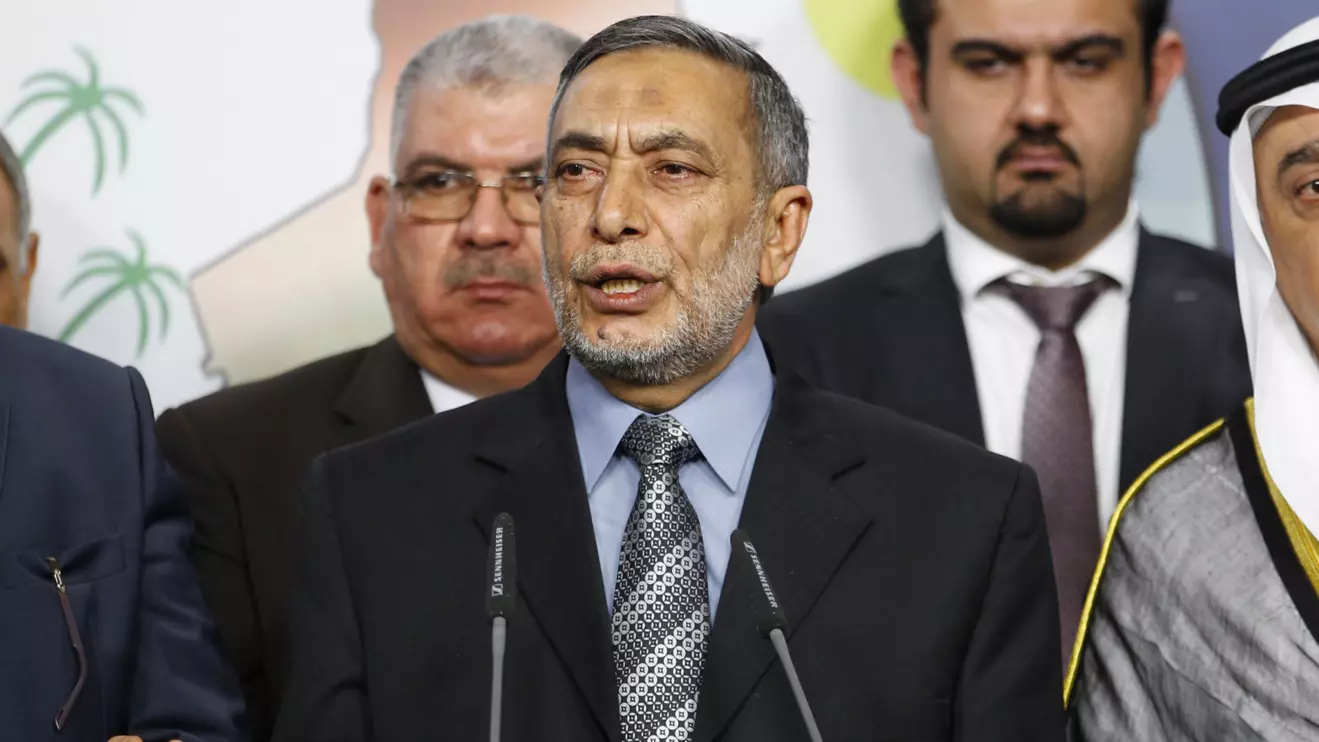 Iraqi Sunni lawmaker Mahmoud al-Mashhadani speaks during a news conference in Baghdad August 23, 2014. Reuters/Thaier al-Sudani