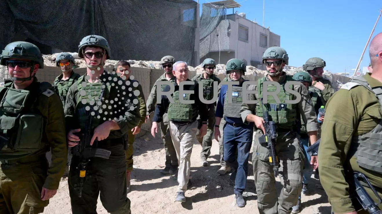 : Israeli Prime Minister Benjamin Netanyahu visits Israeli soldiers in Rafah, in the southern Gaza Strip, in this handout picture from July 18, 2024. Avi Ohayon/GPO/Handout via Reuters 
