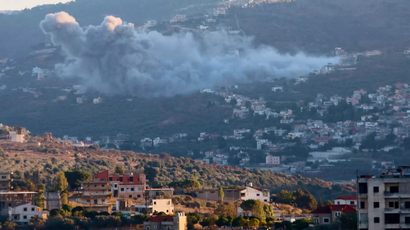 Smoke rises from the southern Lebanese village of Kfar Kila, amid ongoing cross-border hostilities between Hezbollah and Israeli forces, as pictured from Marjayoun, near the border with Israel, September 18, 2024. Reuters/Karamallah Daher