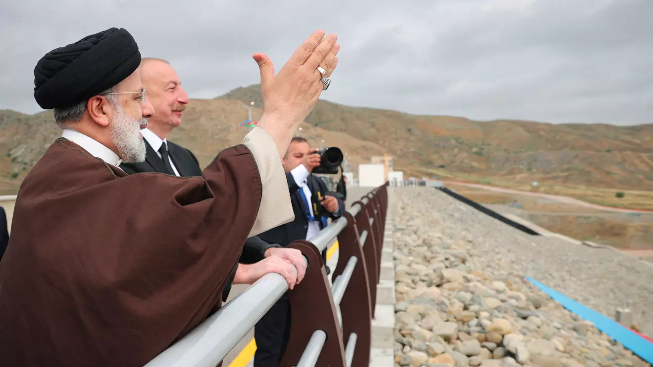 Iranian President Ebrahim Raisi and Azerbaijan's President Ilham Aliyev visit the Qiz-Qalasi dam on the Azerbaijan-Iran border, May 19, 2024. Iran's Presidency/WANAHandout via Reuters