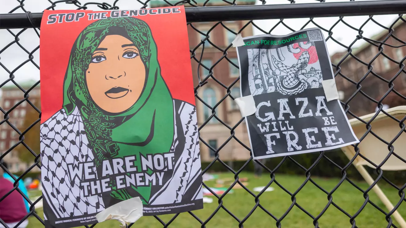 Signs posted on fencing on the main campus are seen as demonstrators protest in solidarity with Pro-Palestinian organizers in a sit in on the Columbia University campus, amid the ongoing conflict between Israel and the Palestinian Islamist group Hamas, in New York City, April 19, 2024. Reuters/Caitlin Ochs
