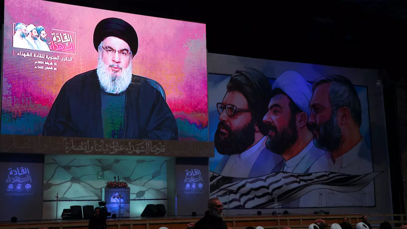 Lebanon's Hezbollah leader Sayyed Hassan Nasrallah appears on a screen as he gives a televised address during a rally commemorating the group's late leaders in Beirut's southern suburbs, Lebanon February 16, 2024. ReutersMohamed Azakir