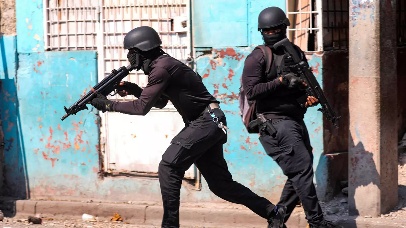 Police officers take part in an operation on the surroundings of the National Penitentiary following a fire, as a powerful gang leader in Haiti has issued a threatening message aimed at political leaders who would take part in a still-unformed transition council for the country, in Port-au-Prince, March 14, 2024. Reuters/Ralph Tedy Erol