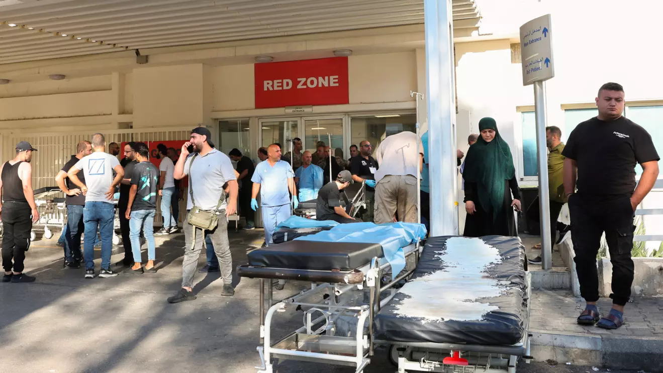 People gather outside a hospital, as hundreds of members of the Lebanese armed group Hezbollah, including fighters and medics, were seriously wounded on Tuesday when the pagers they use to communicate exploded, according to a security source, in Beirut, Lebanon September 17, 2024. Reuters/Mohamed Azakir