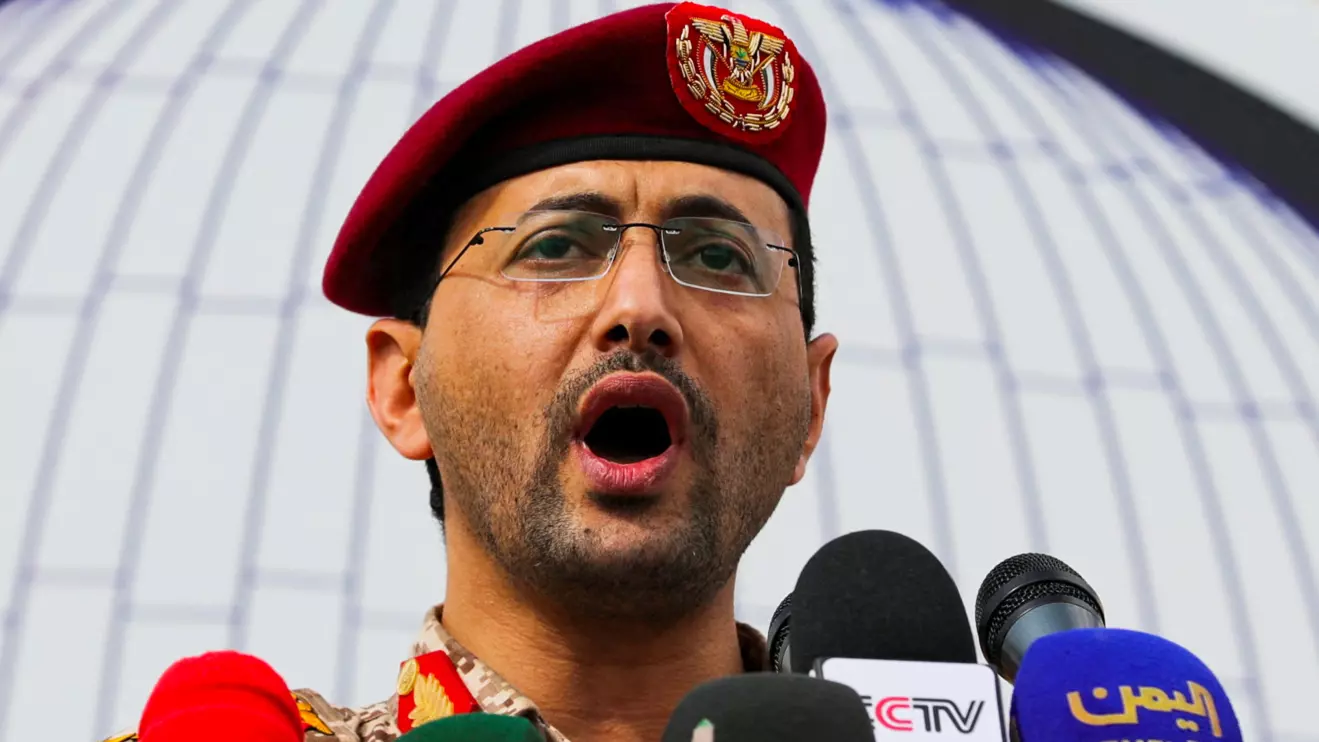 Yahya Sarea, the Houthi military spokesperson, delivers a statement, during a pro-Palestinian rally, saying they launched an attack on the "Pacific 01" ship in the Red Sea with missiles, in Sanaa, March 15, 2024. Reuters/Khaled Abdullah