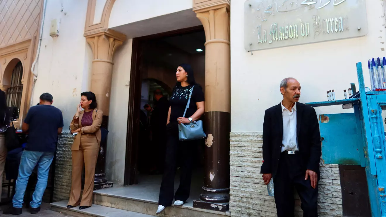 A woman walks out of the building of the Deanship of Lawyers in Tunis, Tunisia May 13, 2024. Reuters/Jihed Abidellaoui