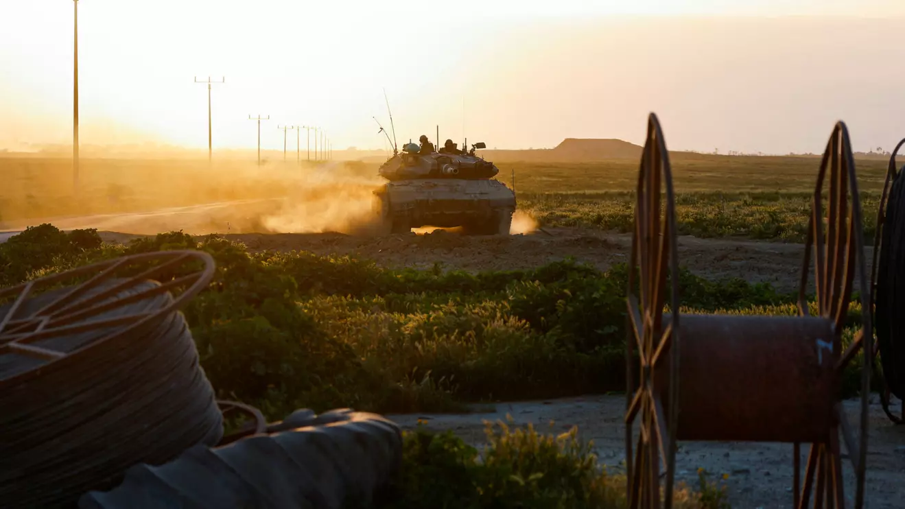 A tank maneuvers near the Israel-Gaza border, amid the ongoing conflict between Israel and the Palestinian Islamist group Hamas, as seen from Israel's border with Gaza in southern Israel, March 6, 2024. Reuters/Amir Cohen