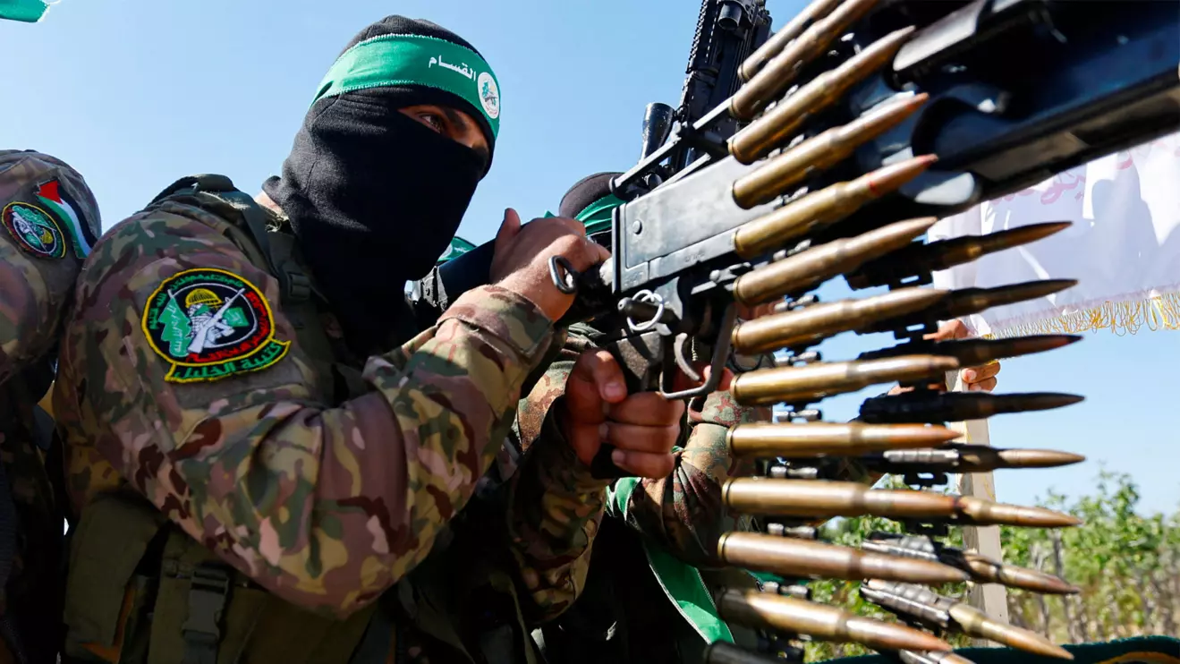 A Palestinian fighter from the armed wing of Hamas takes part in a military parad Reuters/Ibraheem Abu Mustafa/File Photo