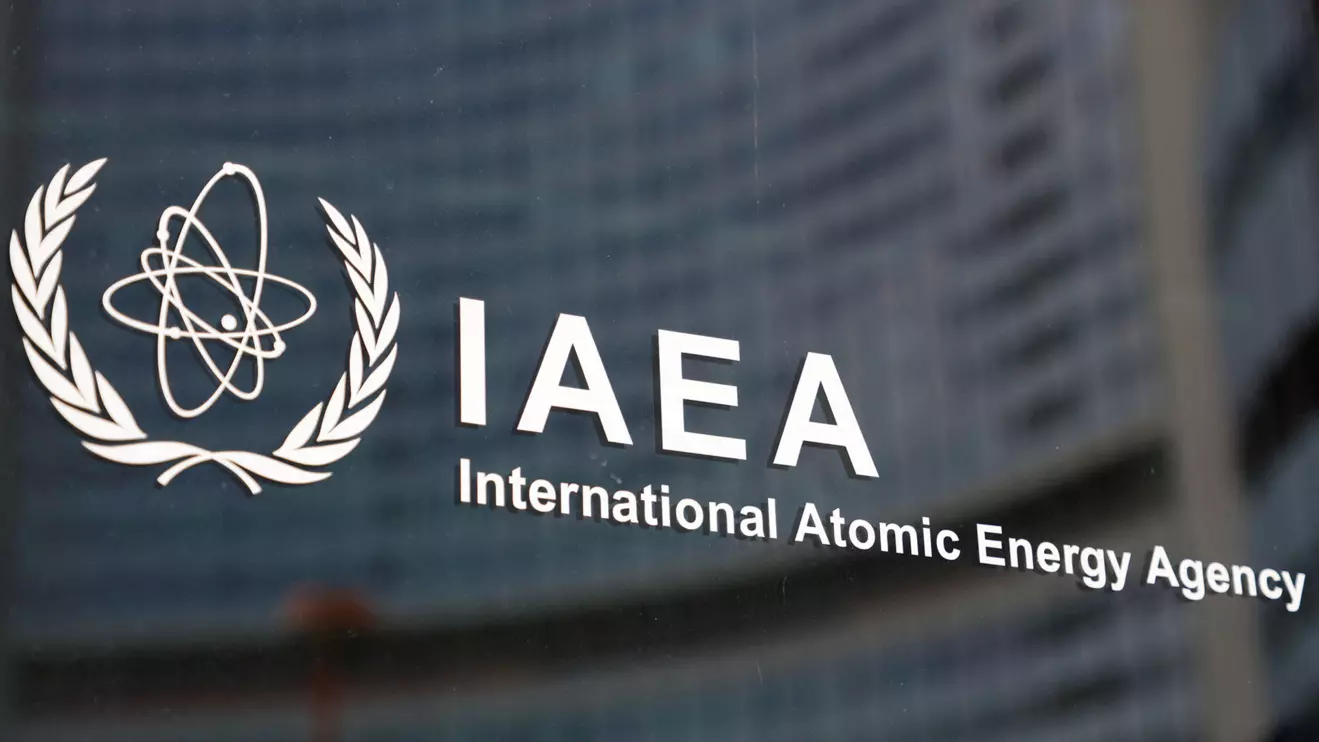 The logo of the International Atomic Energy Agency (IAEA) is seen at the organisation's headquarters in Vienna, Austria, Reuters/Leonhard Foeger