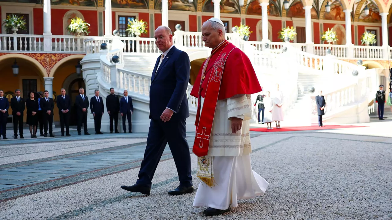Prince Albert II of Monaco and Pope Leo XIV attend a welcoming ceremony at the Prince's Palace as part of Pope's one-day trip, in Monaco, March 28, 2026. Reuters/Guglielmo Mangiapane