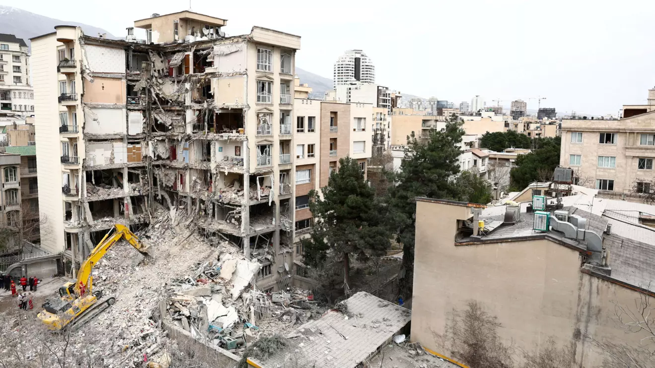 A view of a residential building that was damaged by a strike, amid the U.S.-Israeli conflict with Iran, in Tehran, Iran, March 23, 2026. Majid Asgaripour/WANA (West Asia News Agency) via Reuters