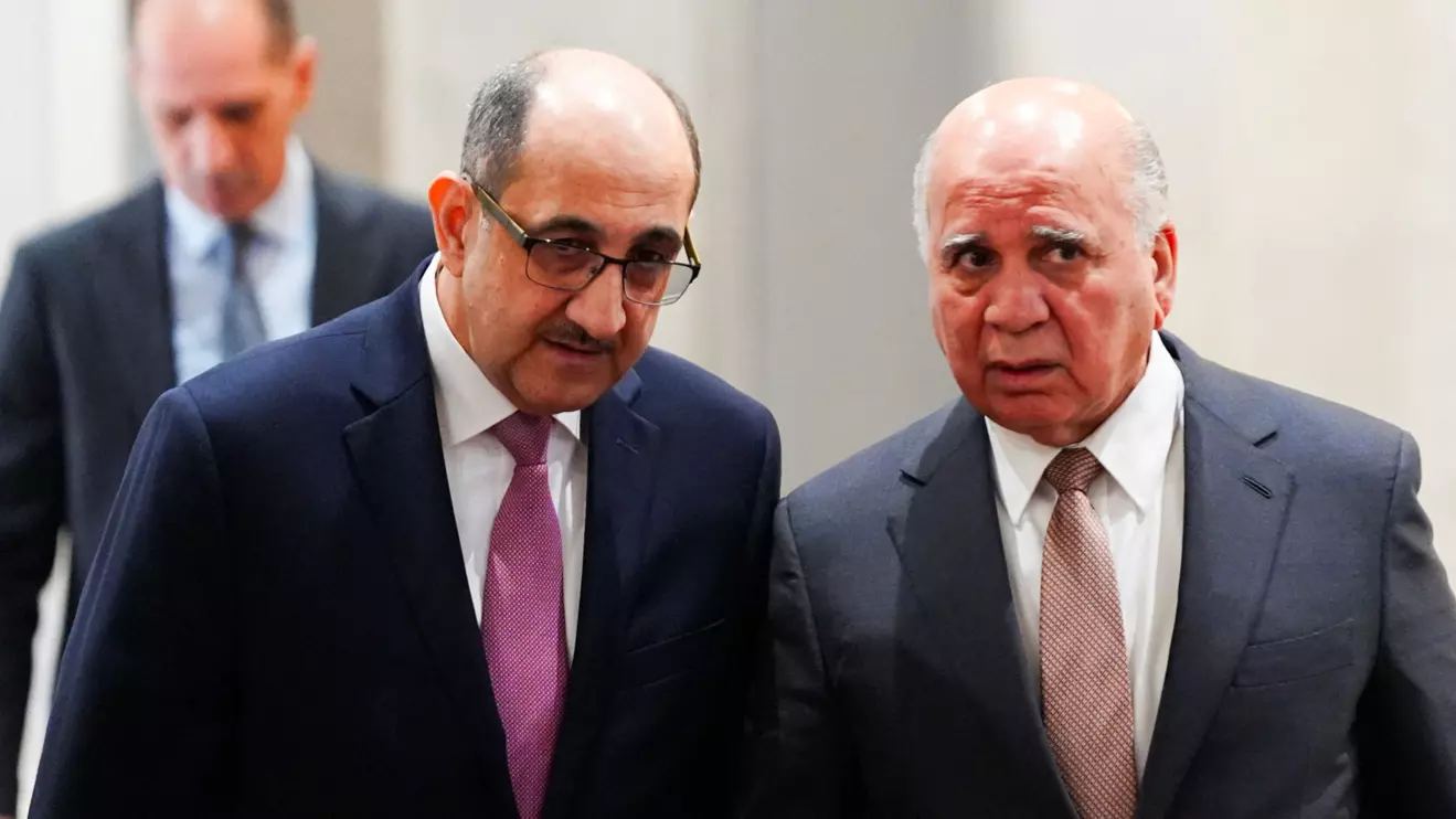 Syrian foreign minister Bassam Sabbagh speaks with his Iraqi counterpart Fuad Hussein during a meeting in Baghdad, Iraq December 6, 2024. Reuters/Mustafa Khasaf