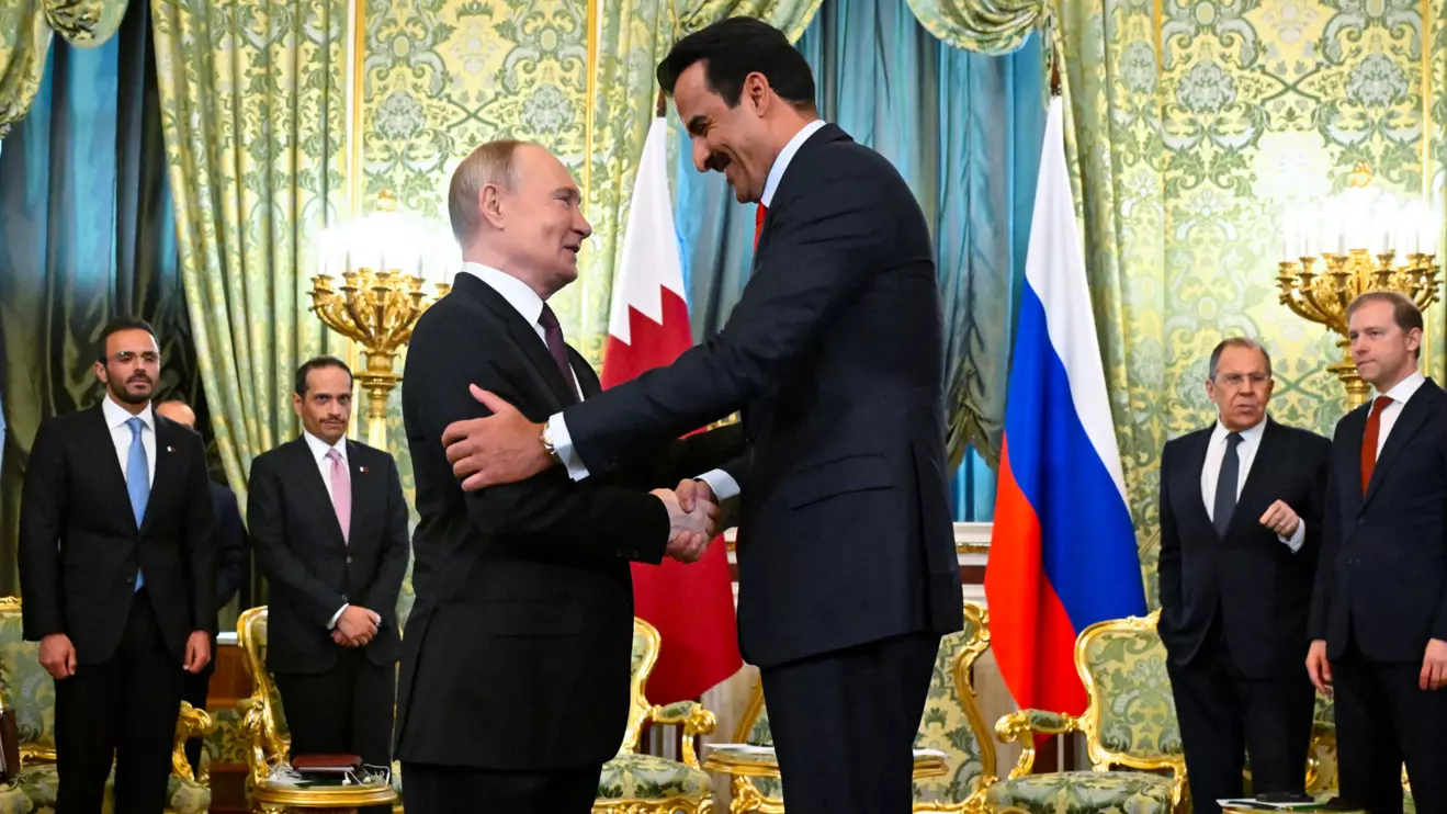 Russia's President Vladimir Putin shakes hands with Qatar's Emir, Sheikh Tamim bin Hamad Al Thani during a meeting at the Kremlin in Moscow, Russia, April 17, 2025. Alexander Nemenov/Pool via Reuters