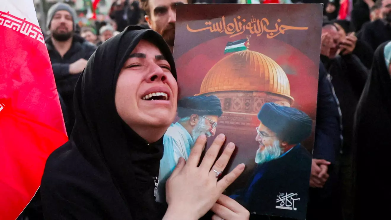 A woman reacts as people gather at the Enghelab Square, after Iran's Supreme Leader Ayatollah Ali Khamenei was killed in Israeli and U.S. strikes on Saturday, in Tehran, Iran, March 1, 2026. Majid Asgaripour/WANA (West Asia News Agency) via Reuters