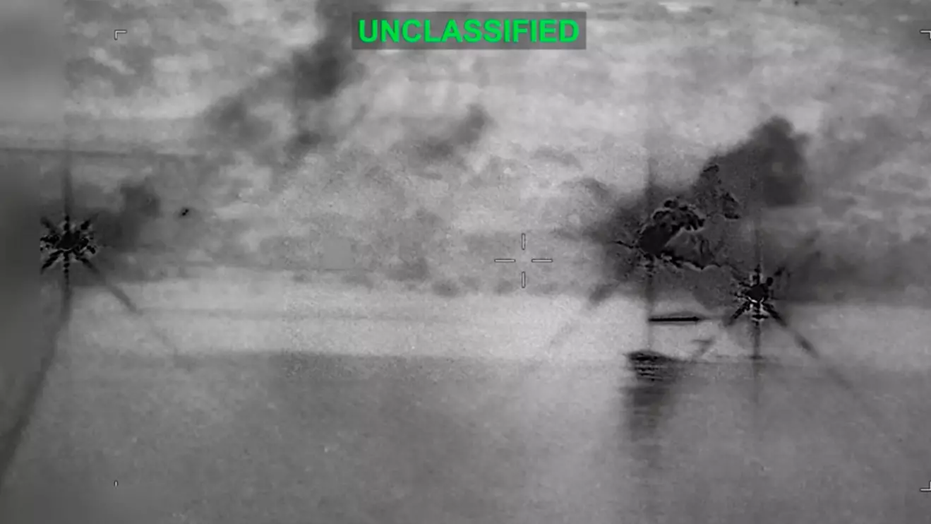 Smoke rises at an unknown location following what U.S. Central Command says is a new wave of strikes against Iran on Tuesday after three tankers were hit by projectiles in the Strait of Hormuz, in this still image taken from video released July 7, 2026. U.S. Central Command/Handout via Reuters