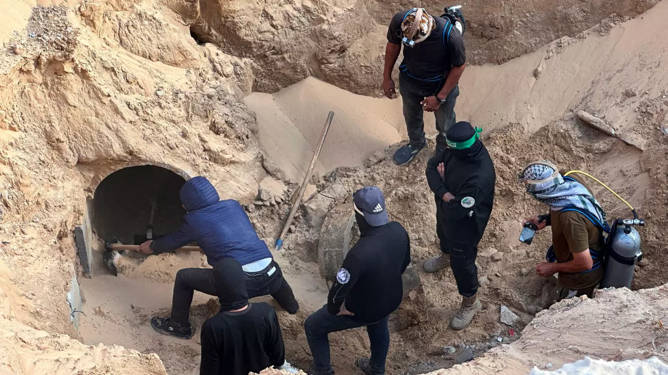 People work at a site where searches for deceased hostages, kidnapped by Hamas during the October 7, 2023, attack on Israel, are underway, amid a ceasefire between Israel and Hamas, in Khan Younis, southern Gaza Strip, October 28, 2025. Reuters/Haseeb Alwazeer