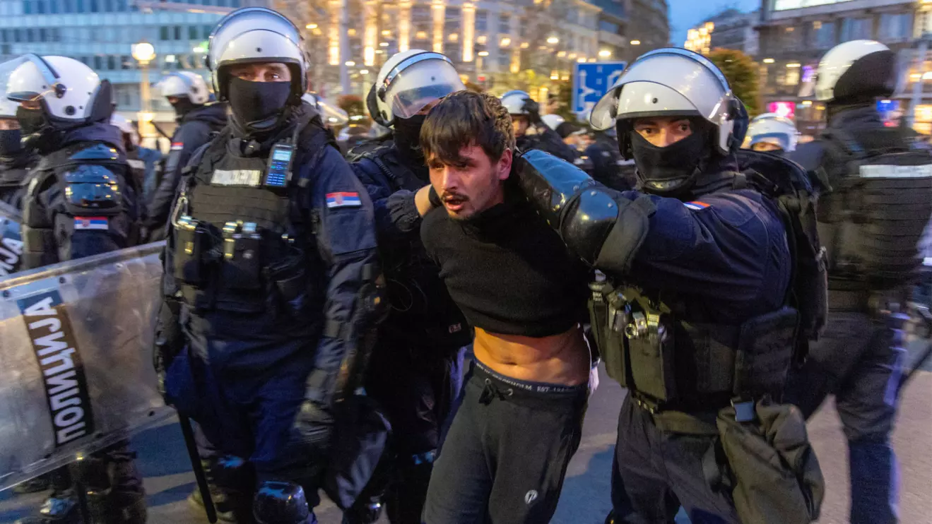 Police officers detain a demonstrator as people rally to protest police search of Belgrade's university offices after the accidental death of a student last week, in Belgrade, Serbia, March 31, 2026. Reuters/Djordje Kojadinovic