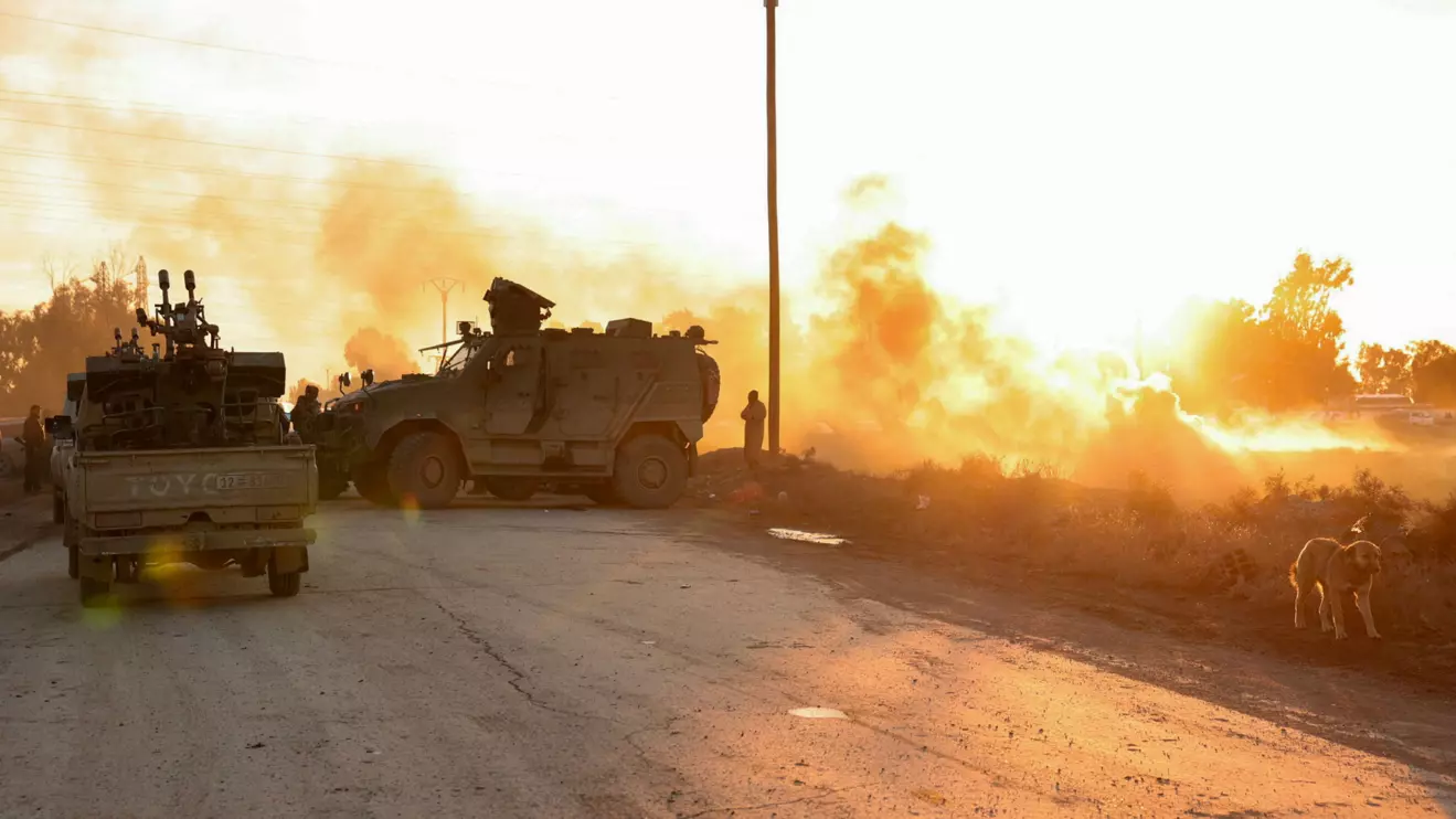 Military members gather near Raqqa prison, where the Syrian army is besieging SDF members after the Syrian army took control of the city of Raqqa, Syria January 19, 2026. Reuters/Mahmoud Hassano