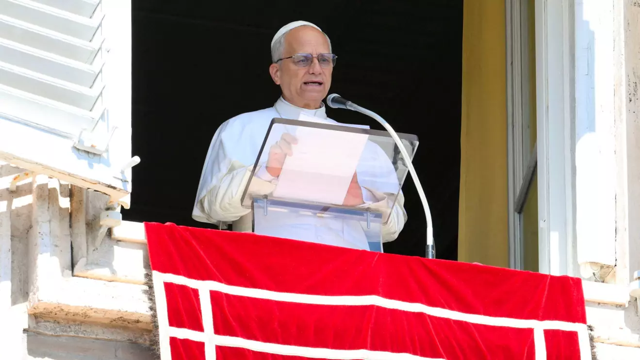 Pope Leo XIV speaks as he appears to lead the weekly Angelus prayer, at the Vatican, September 21, 2025. Vatican Media/Mario Tomassetti