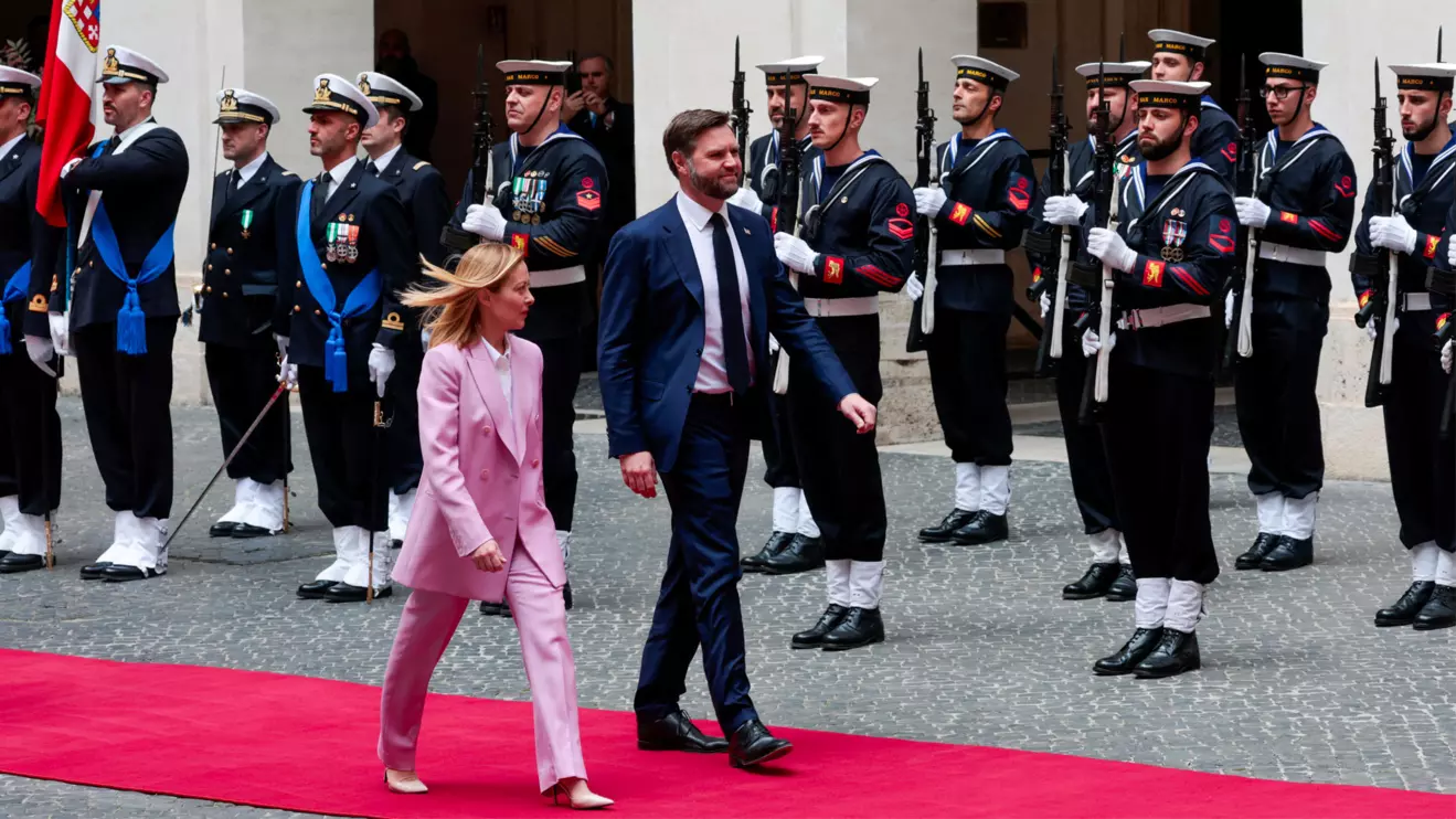Italy's Prime Minister Giorgia Meloni and U.S. Vice President JD Vance walk, as they meet at Chigi Palace, in Rome, Italy, April 18, 2025. Reuters/Remo Casilli