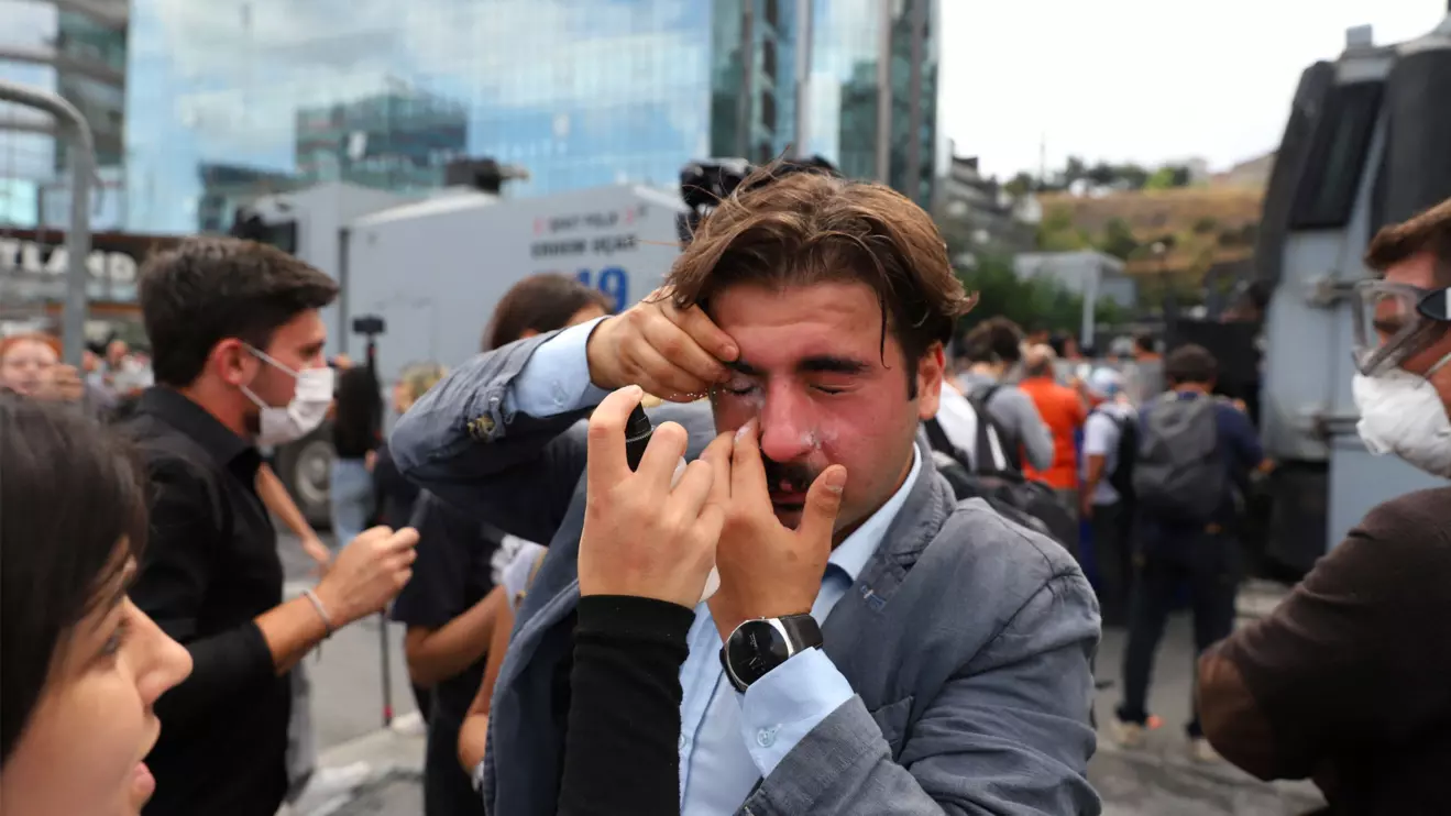 A supporter of Turkey’s main opposition Republican People’s Party (CHP), reacts to tear gas as people try to pass by the police barricade to reach the CHP Istanbul provincial office, after a recent court ruling that ousted the CHP's Istanbul provincial leadership, in Istanbul, Turkey, September 8, 2025. Reuters/Dilara Acikgoz
