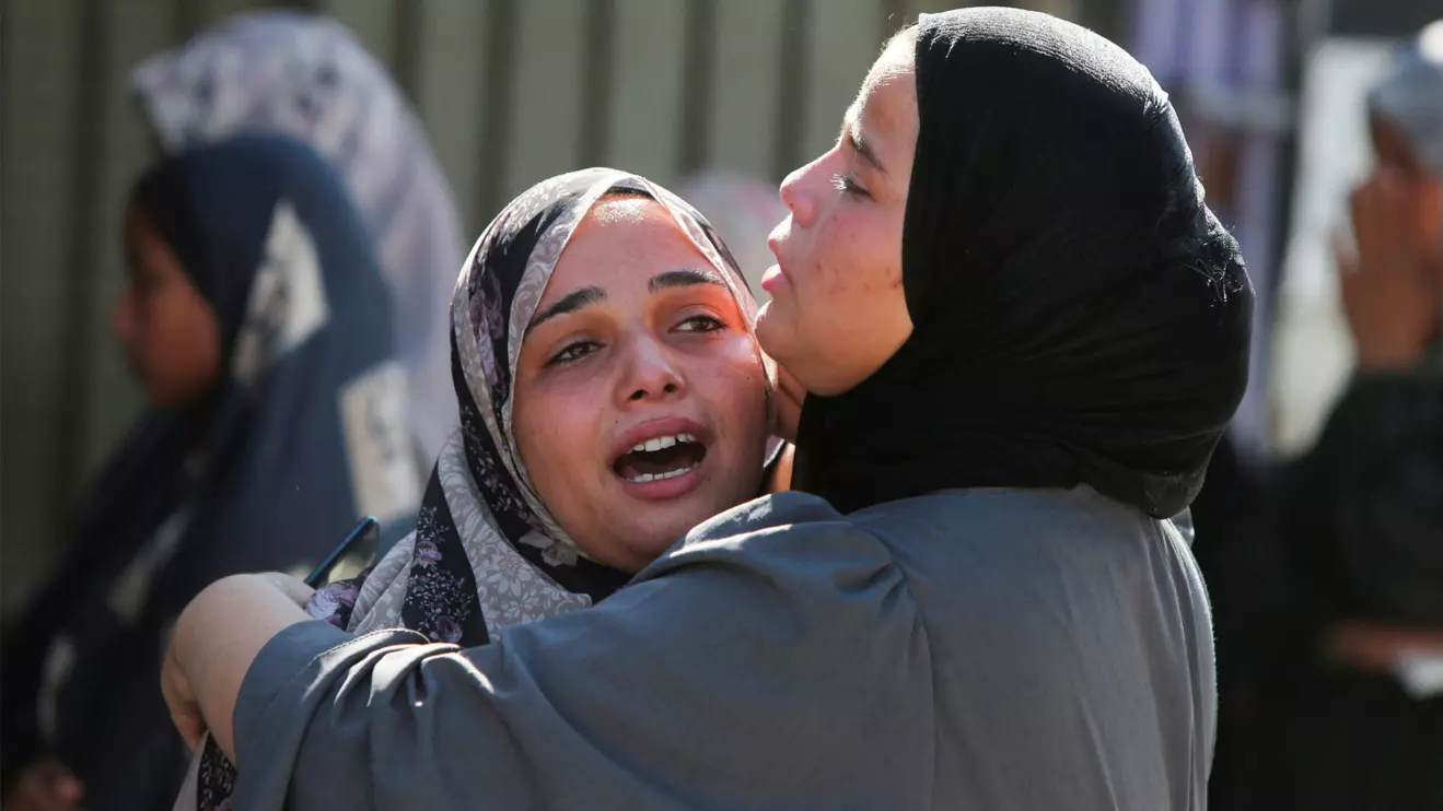 People mourn Palestinians who were killed in an incident on Wednesday while seeking aid in Khan Younis, at Nasser hospital in Khan Younis in the southern Gaza Strip July 16, 2025. Reuters/Hatem Khaled