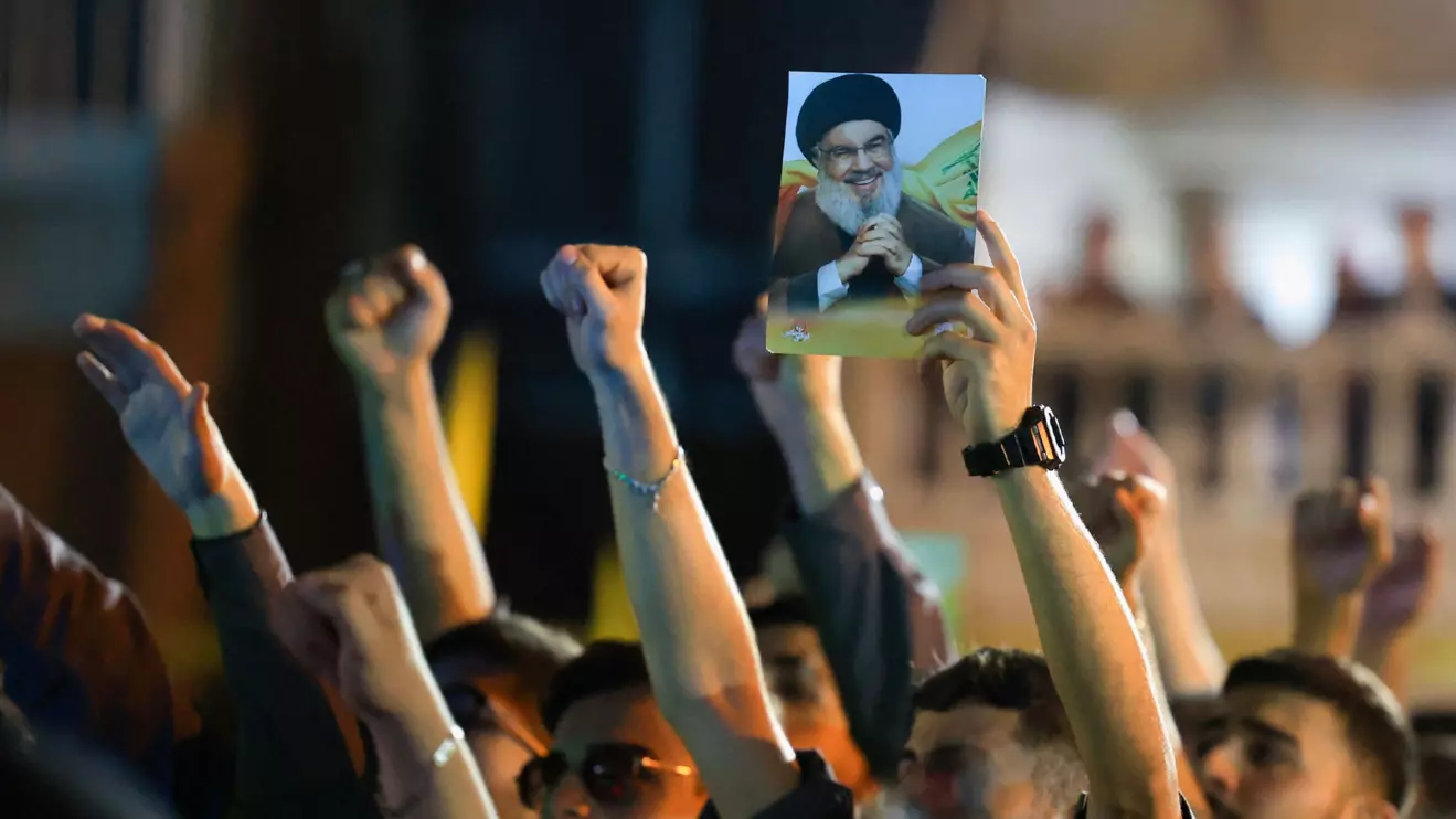 Hezbollah supporters gesture as they gather at the site where the group's late leader Hassan Nasrallah was killed, before the first anniversary of his assassination in an airstrike, in Beirut's southern suburbs, Lebanon, September 26, 2025. Reuters/Mohamed Azakir