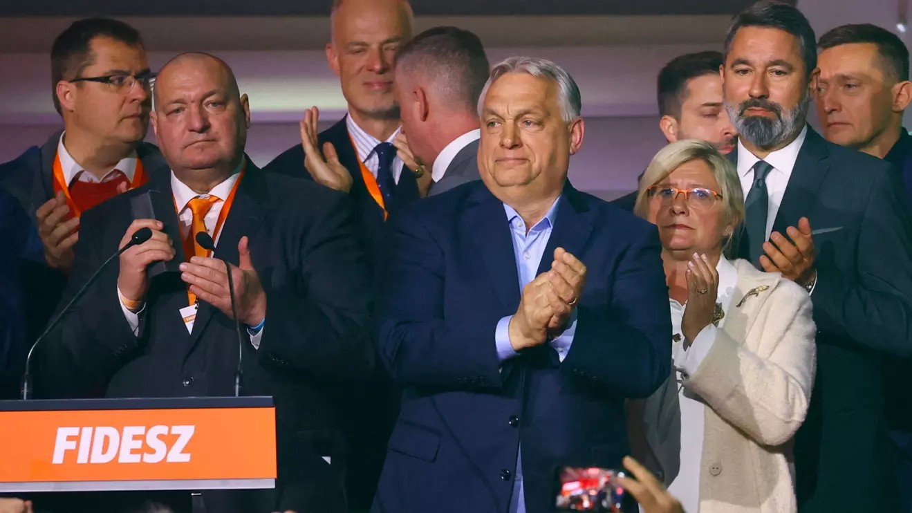 Hungarian Prime Minister Viktor Orban reacts as people applaud after the announcement of the partial results of parliamentary election in Budapest, Hungary, April 12, 2026. Reuters/Bernadett Szabo
