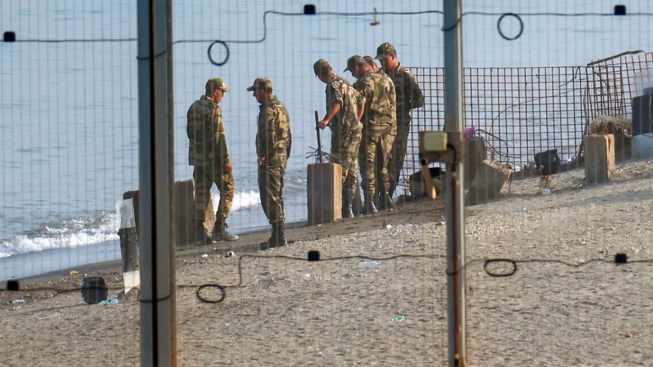 Military personnel work on the border with Morocco in Ceuta, following mass crossings of migrants on foot and by sea from Morocco into Spanish territory, in Ceuta, Spain, August 14, 2026. Reuters/Pedro Nunes