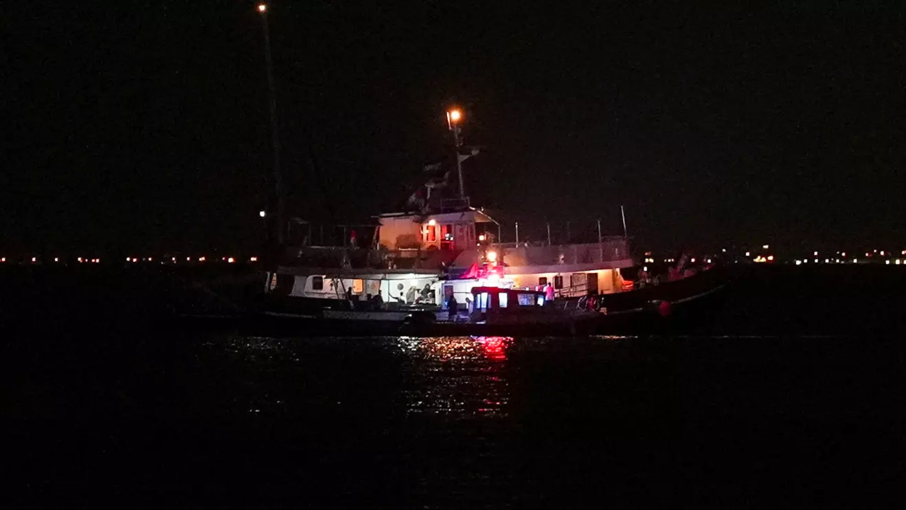 A Global Sumud flotilla vessel floats in the waters as Tunisian Maritime National Guard boats conduct an inspection in Sidi Bou Said, Tunisia, September 9, 2025. Reuters/Jihed Abidellaoui